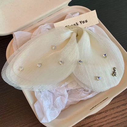 Tulle butterfly hair grip barrette in French retro design available in five solid colours