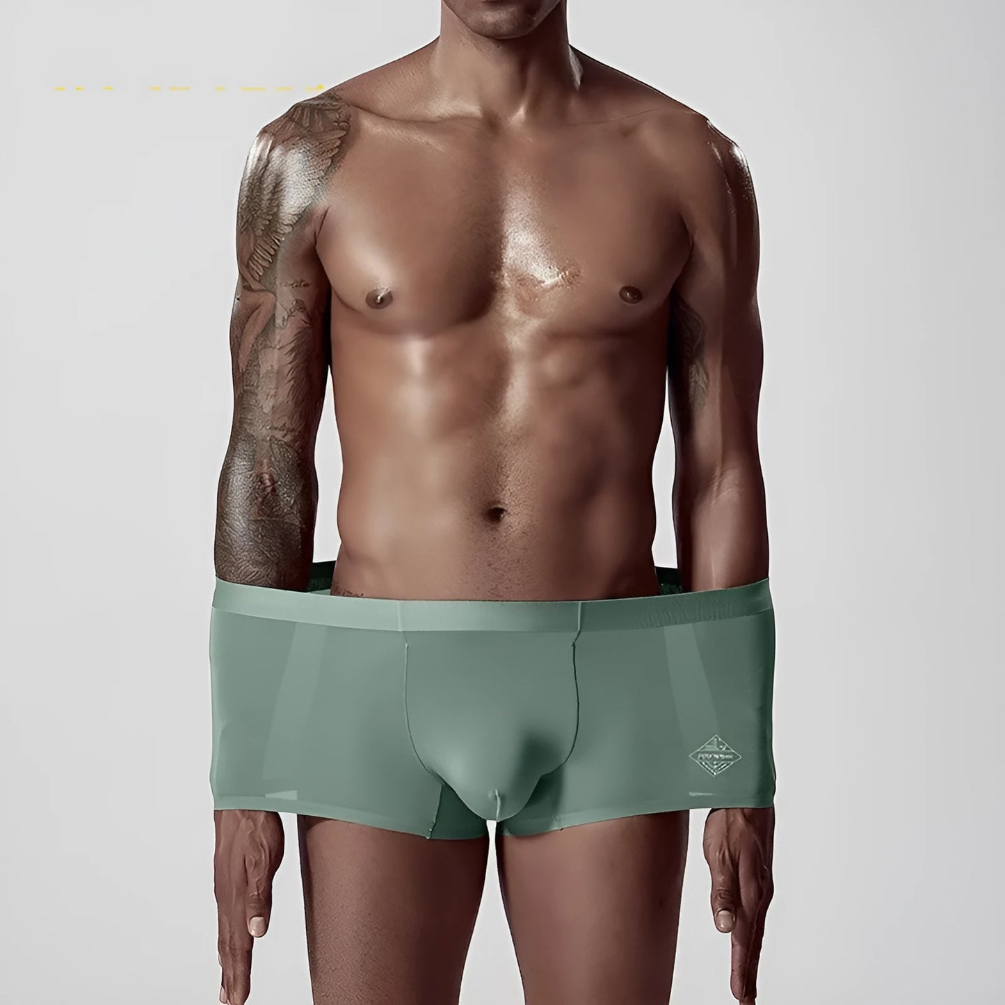 Men's solid colour seamless modal underwear in mid-waist style on a white background.