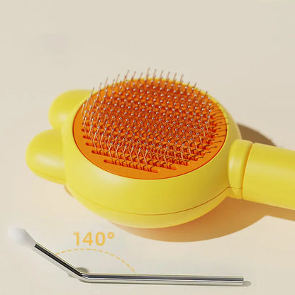 Green self-cleaning pet grooming brush with release button and stainless steel comb on a wooden table.