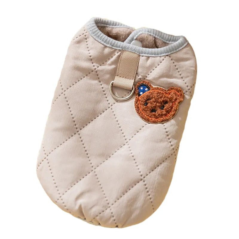 Quilted pet vest for small dogs with bear patch and polka-dot ears, padded dog gilet in cream or beige, sizes XS to XL.