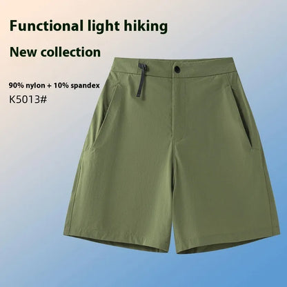 Men's khaki sports shorts with quick-drying fabric and elastic waist for running and climbing activities