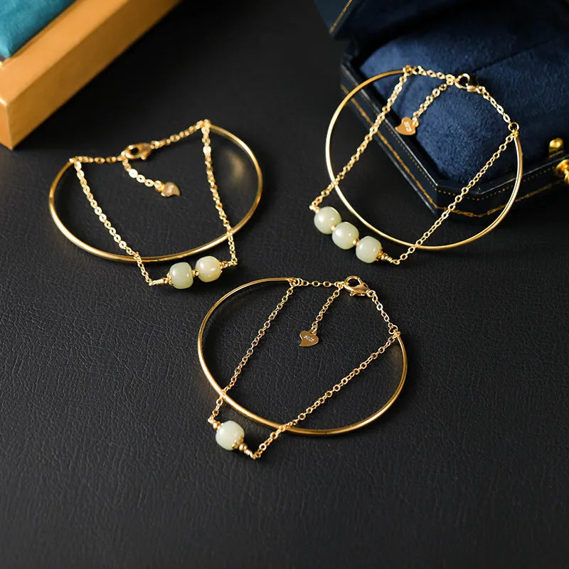Women's Hetian jade lucky beads bracelet with gold inlay, shown in faux two-piece design.