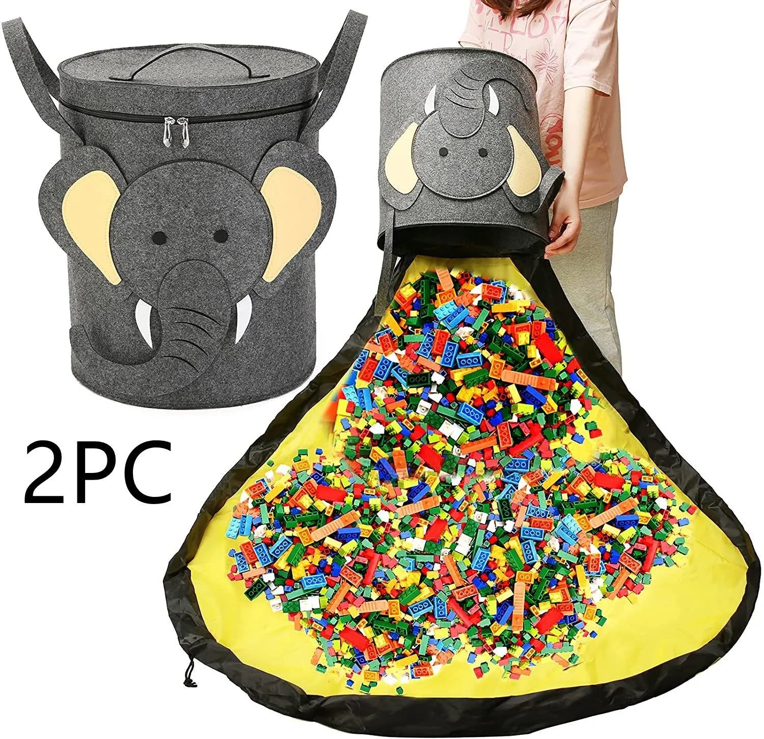 Green felt storage cube with pull rope, unfolded flat as a square play mat next to toys.