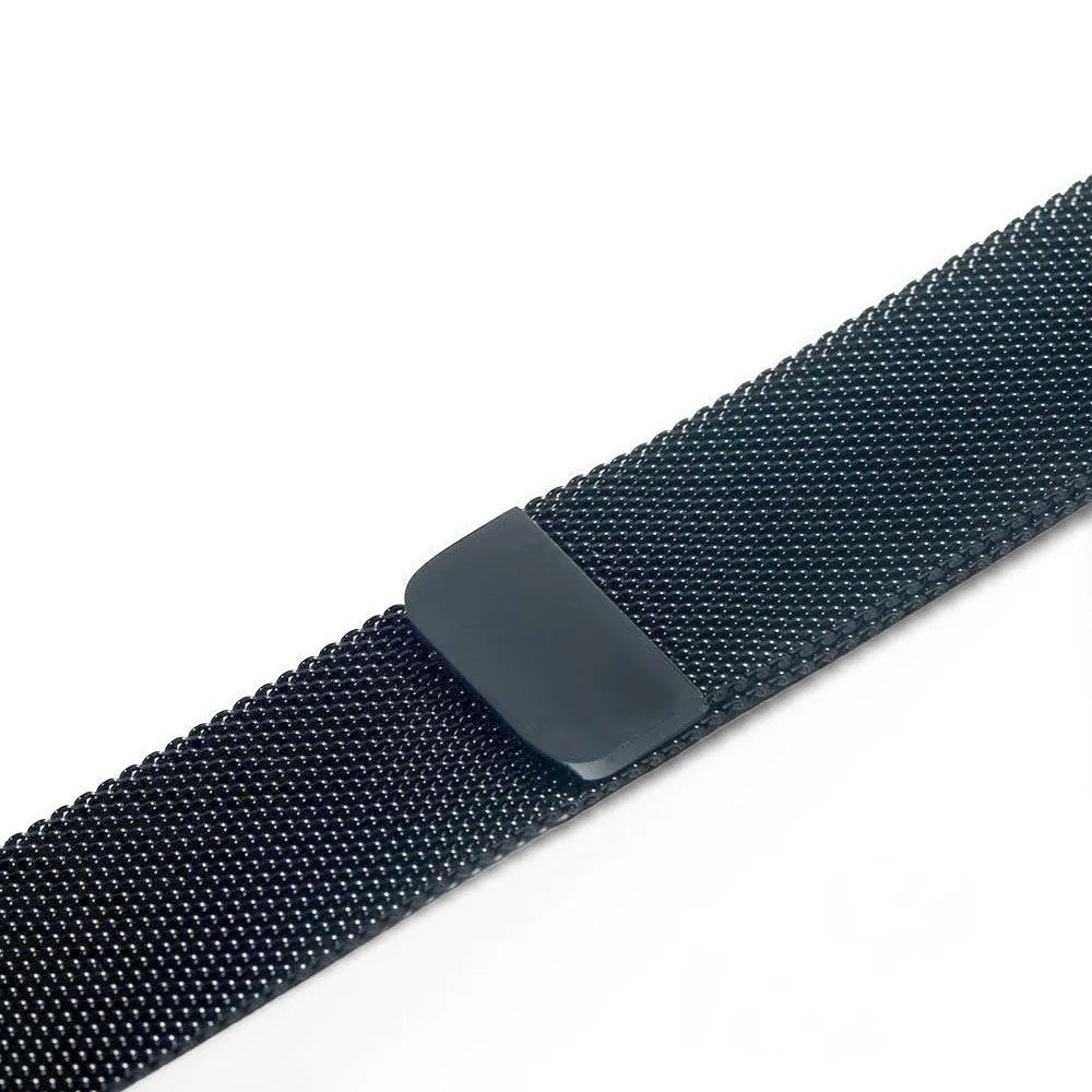 Stainless steel Apple Watch strap in silver on a wrist, showing the metal links and secure clasp.
