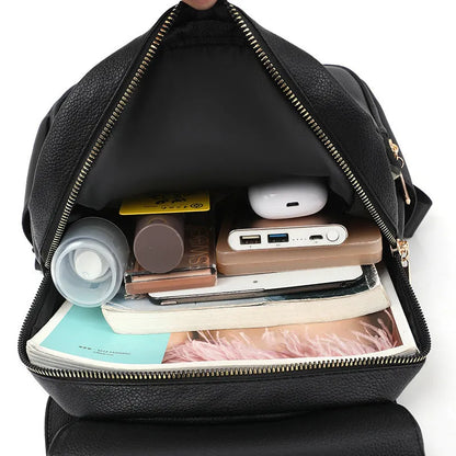 Women's black leather backpack with three-dimensional pockets and street trend design