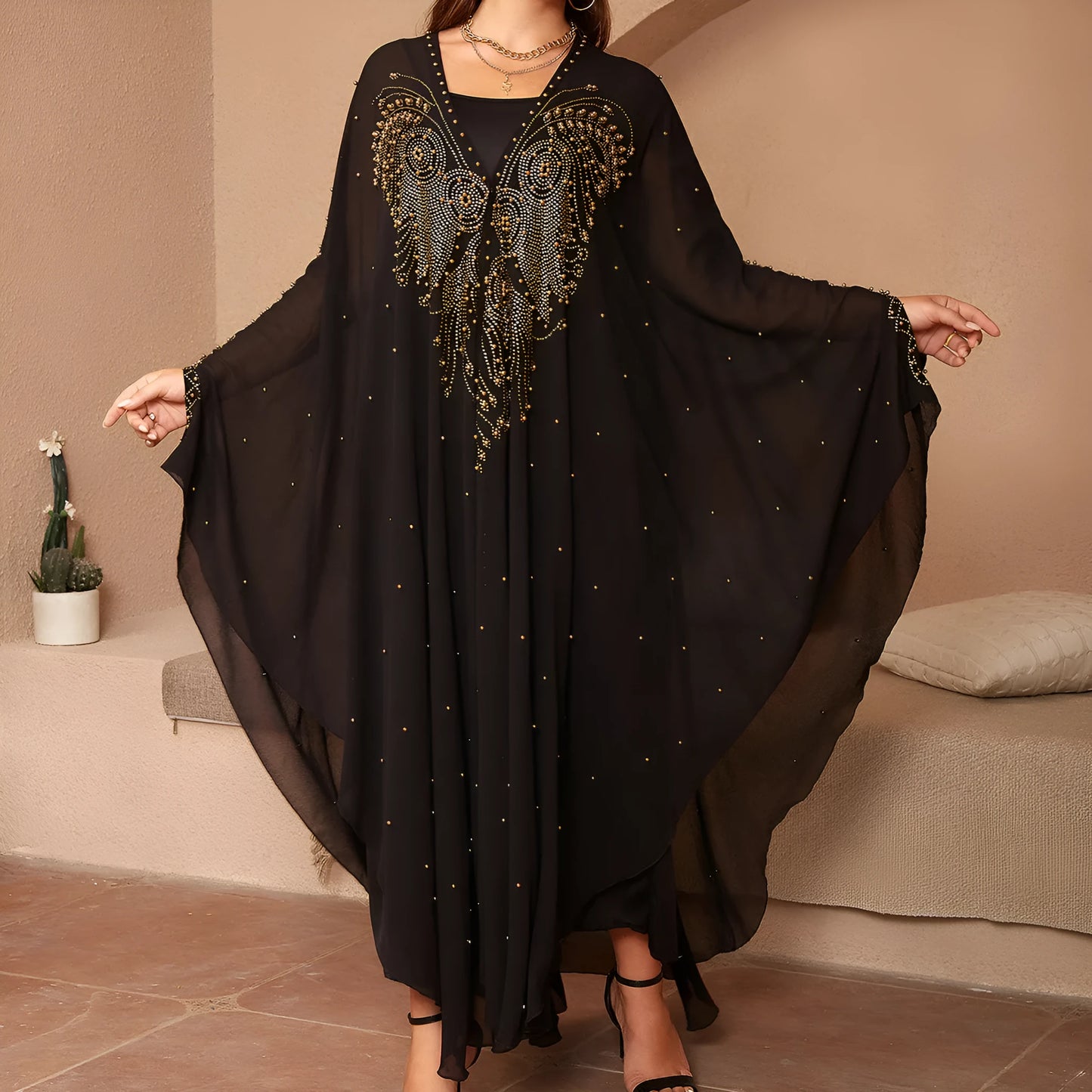 Purple chiffon Muslim style shawl with rhinestone beaded trim laid flat showing its long length.