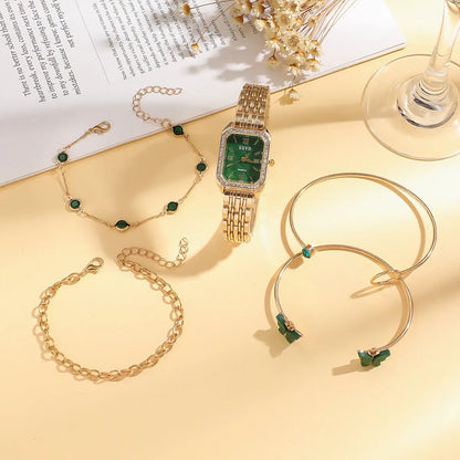 Gold green square women's watch with four matching butterfly bracelets on display