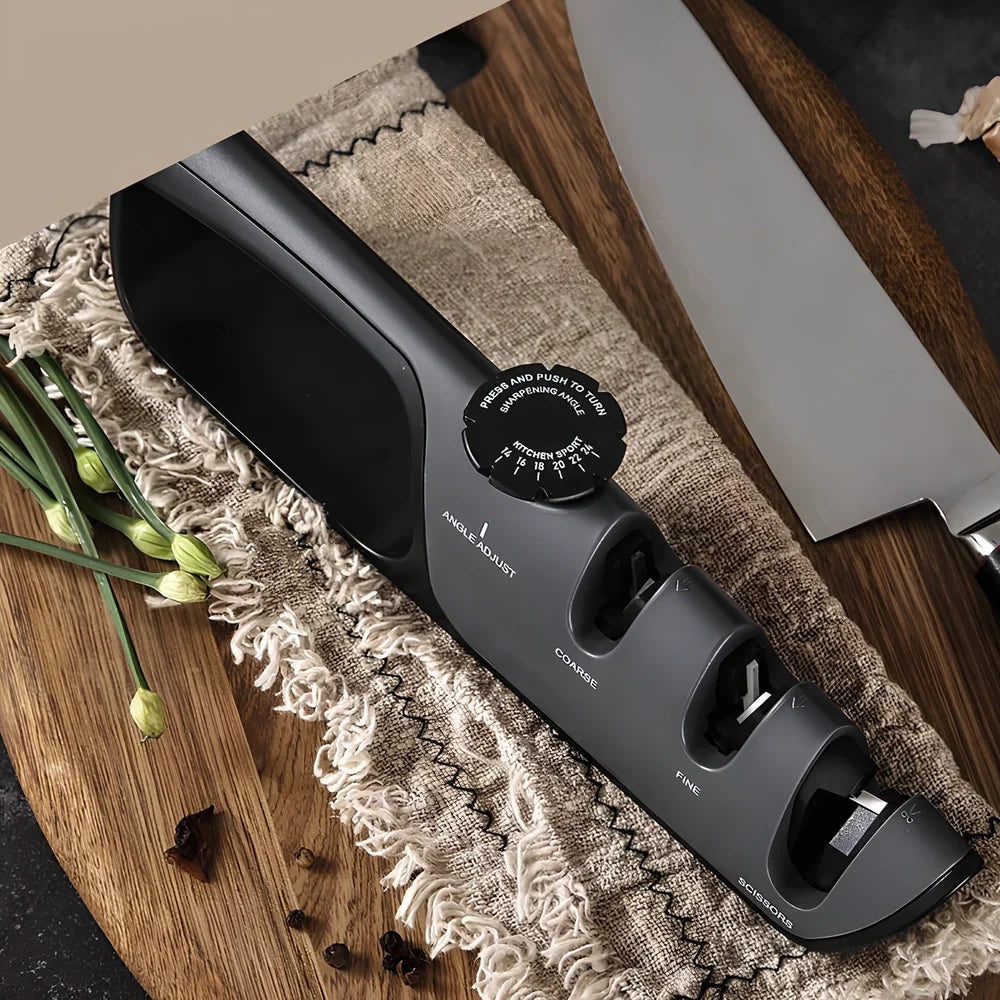 Grey-black manual sharpener with adjustable mechanism for knives and scissors measuring 265x70x45mm