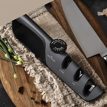Grey-black manual sharpener with adjustable mechanism for knives and scissors measuring 265x70x45mm
