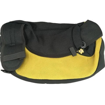 A comfortable and stylish pet sling bag with padded mesh and leather details, allowing hands-free travel for pet owners.