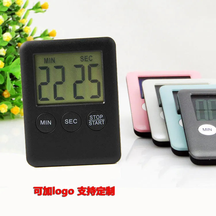 Digital kitchen timer with magnetic back showing countdown display in black or white options