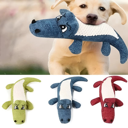 Blue corn grid plush toy for pets with biting sound function next to green and red versions.