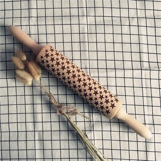 Festive rolling pin with embossed Christmas designs for easy imprinting on dough