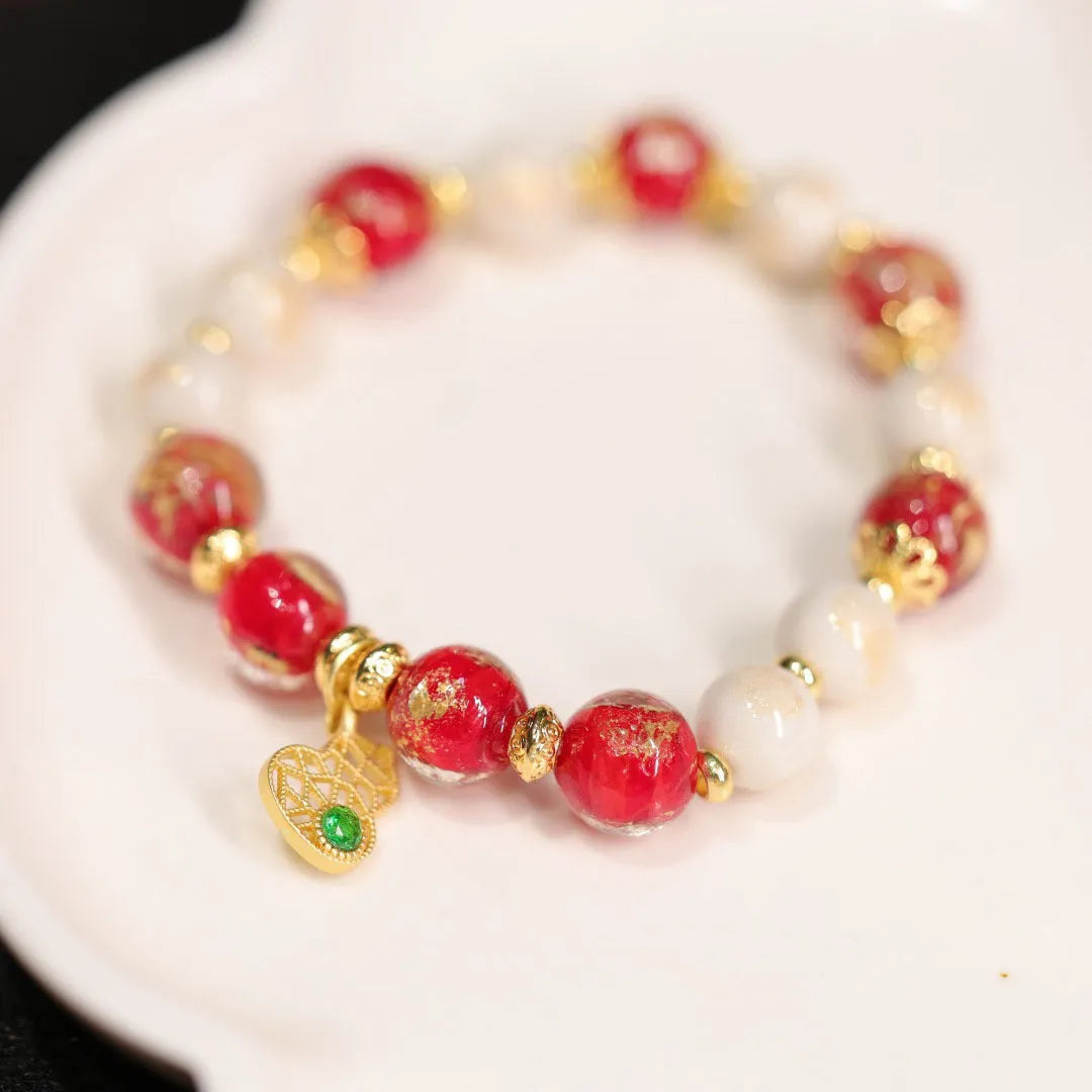 Women's geometric ethnic style bracelet with gold foil decoration on coloured glaze in two colour variations