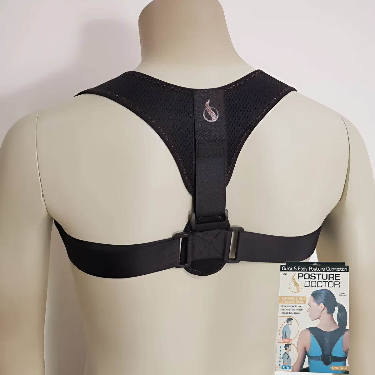 Clavicular posture correction belt with adjustable shoulder straps on a neutral background.