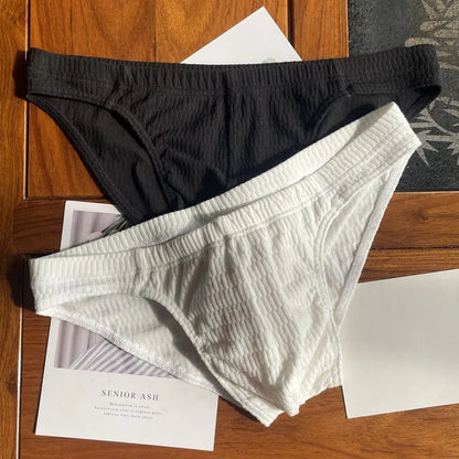 Men's solid colour pure cotton triangle underwear briefs on a mid-waist fit model