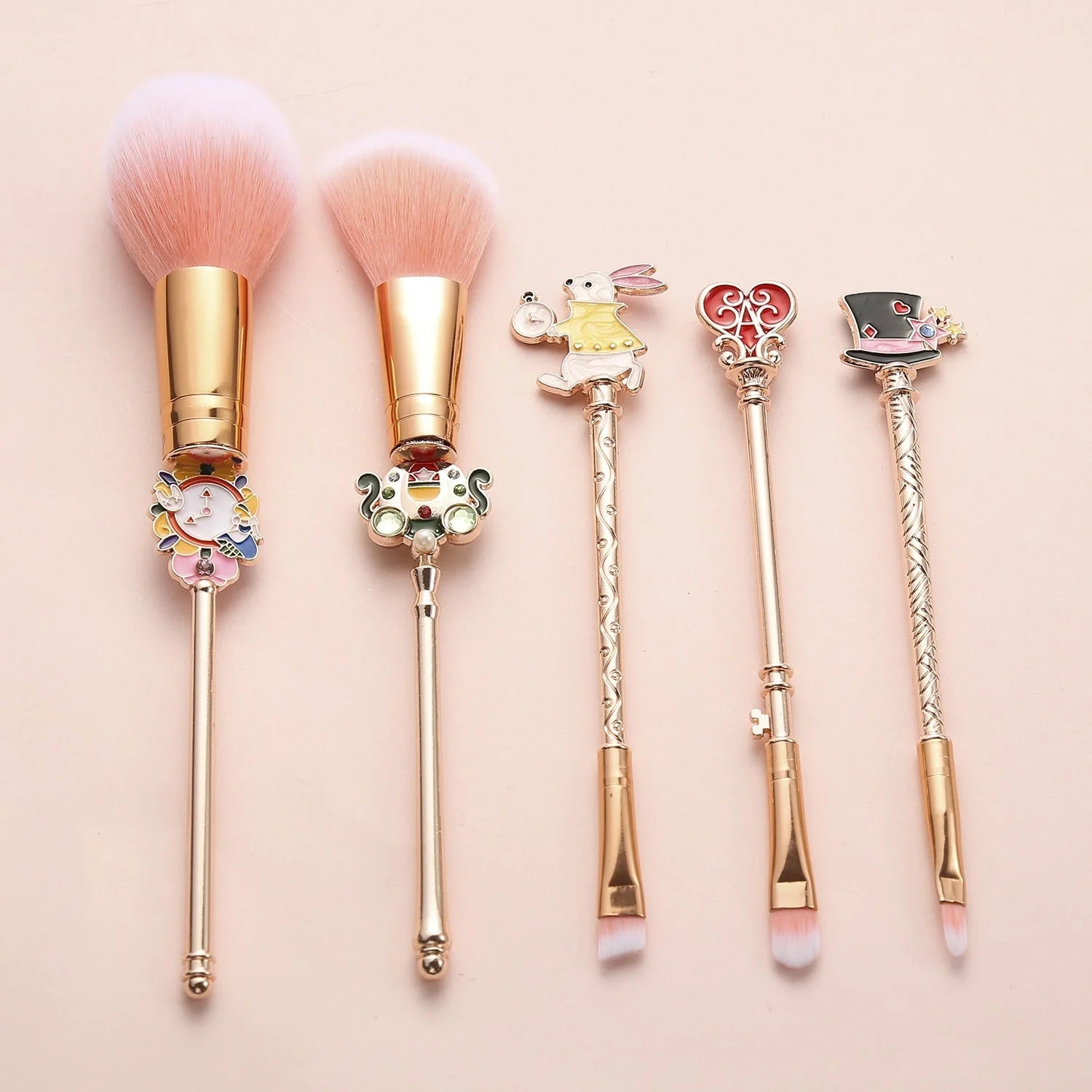 Alice makeup brush in rose gold and gold finishes for precise application