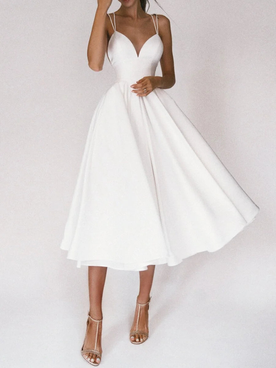 Elegant V-neck dress with adjustable straps, available in a range of vibrant colours for stylish summer wear