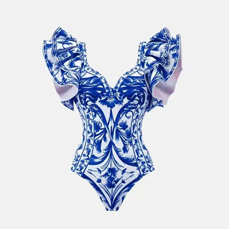 Women's printed one-piece swimsuit in rose pink on a mannequin.