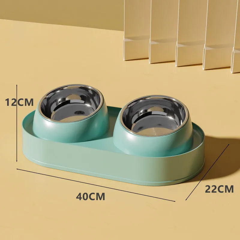 White elevated pet feeder with two tilted bowls on a non-slip base, for cat and small dog food and water.