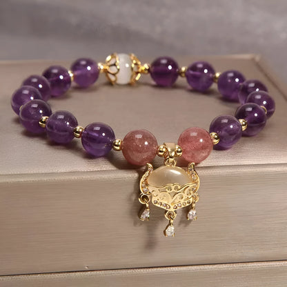 Copper longevity lock bracelet for women with drop-shaped charm, Ruyi and safety lock symbols.