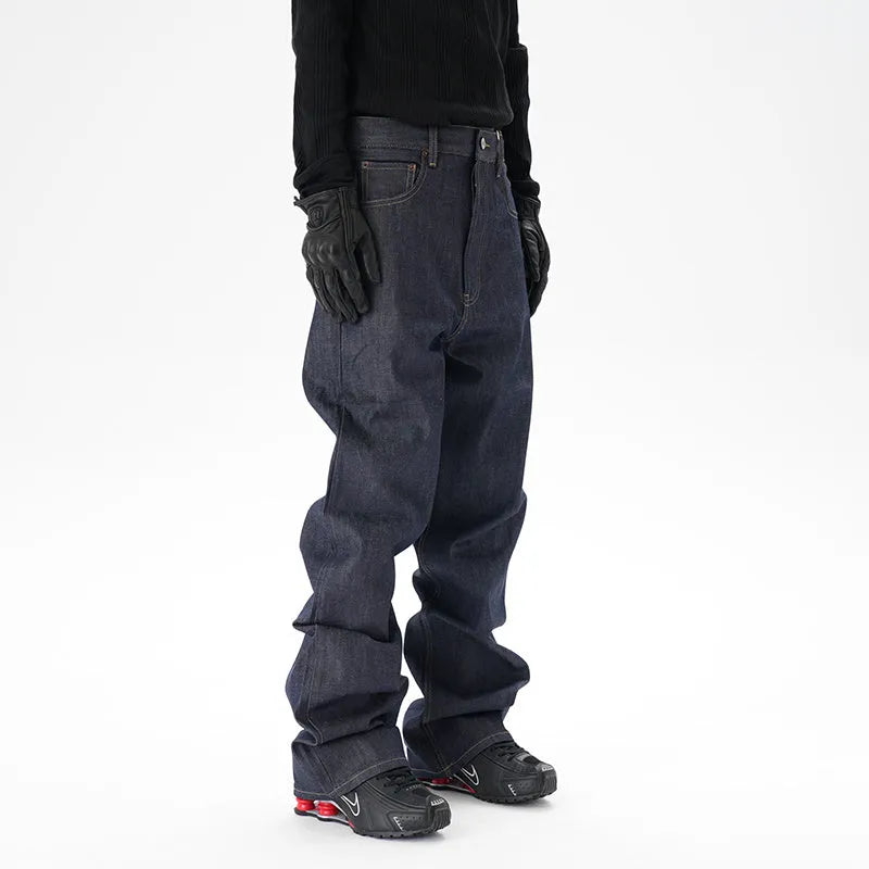 Men's dark blue loose straight-leg denim jeans laid flat, showing front view.