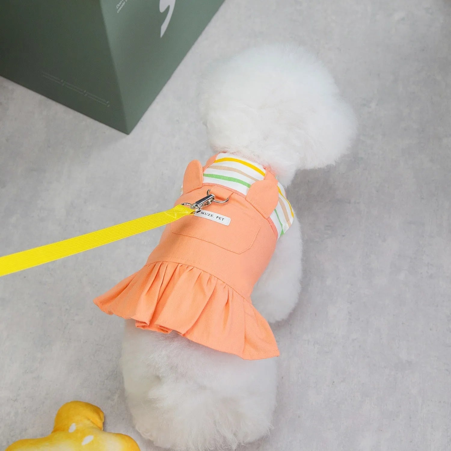 Orange and yellow striped patchwork cotton dog skirt shown in casual style