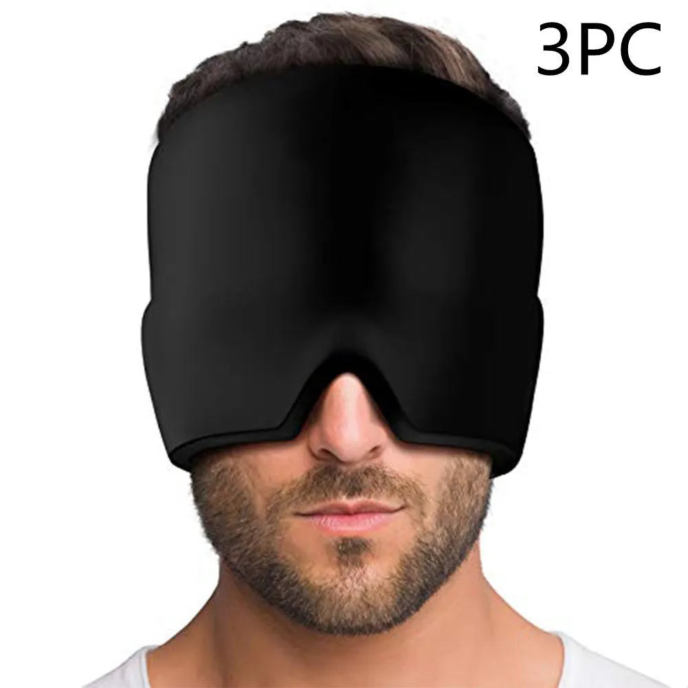 Black elastic cloth gel cold compress eye mask for headache relief on a grey background.