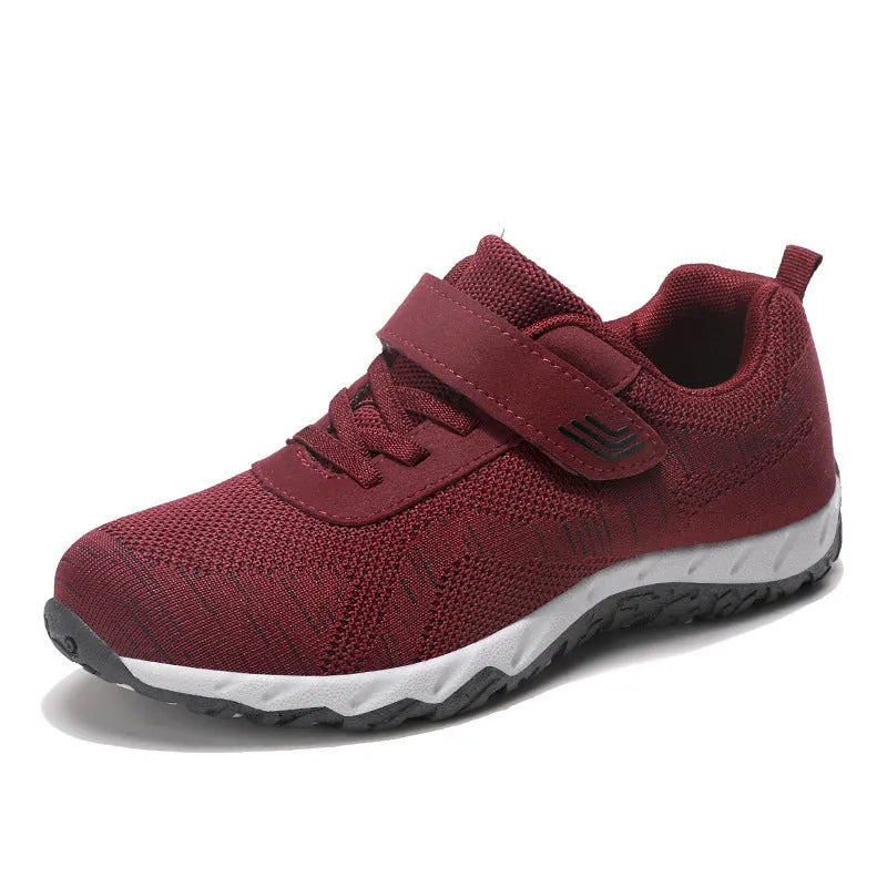 Women's gray purple casual shoes with mesh upper, wedge heel, and Velcro strap.