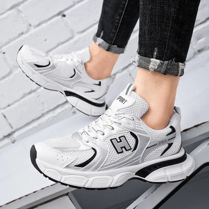 Men's mesh running shoes with plastic sole in black, white and grey, or white and orange colours