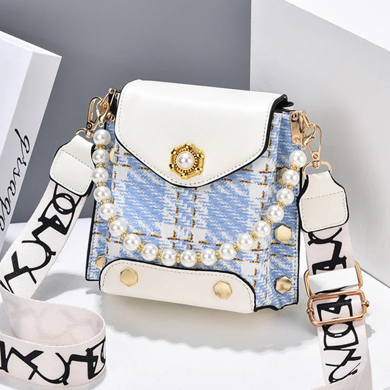 Stylish crossbody bag for women with delicate pearl pendant and adjustable strap for versatile carrying options