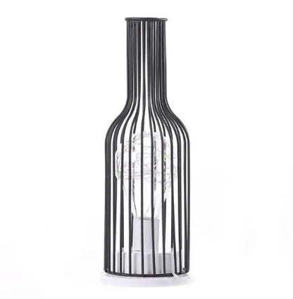 Minimalist wrought iron table lamp shaped like wine bottle with warm white LED light
