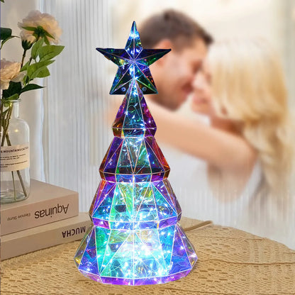 Colourful cartoon-style LED Christmas tree light on a table, showing its 20cm height and PET plastic construction.