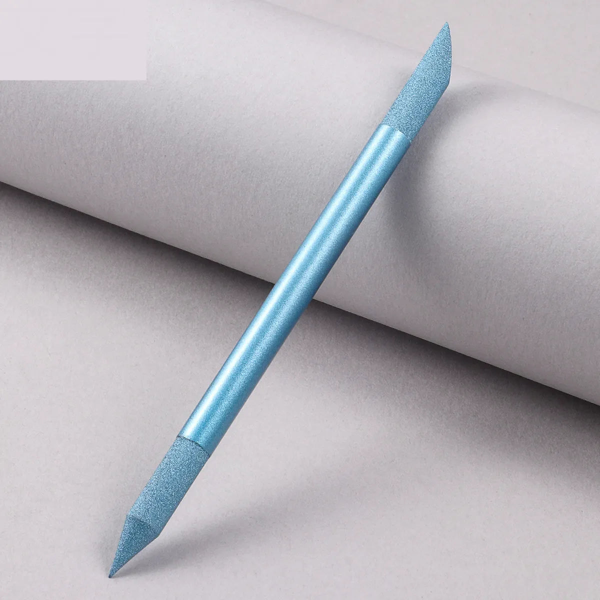Nano glass nail polishing frotton tool in various solid colours.