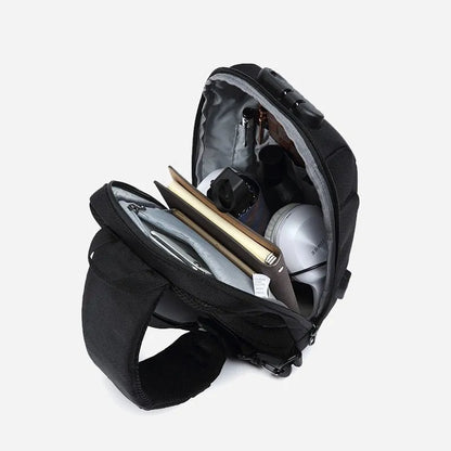 Anti-theft USB chest bag in Oxford cloth with zip closure, square vertical section, and polyester lining, shown in dark blue.