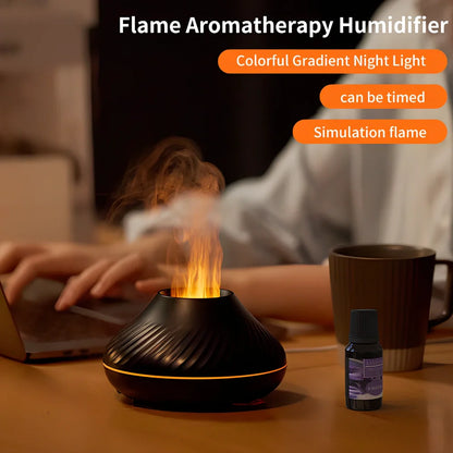 Black RGB flame aroma diffuser 130ml showing 3D colourful volcano mist effect on table