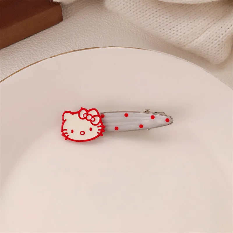 Red love heart-shaped hair barrette clip with retro white dots on a willow leaf-shaped base.