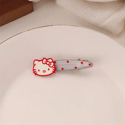 Red love heart-shaped hair barrette clip with retro white dots on a willow leaf-shaped base.