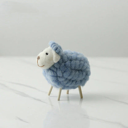 Plush sheep figurines in various colors and sizes, perfect for home decoration and gifting