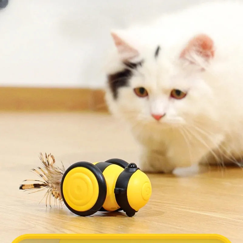 Electric cat toy with bee design and feather teaser in pink or yellow colour options