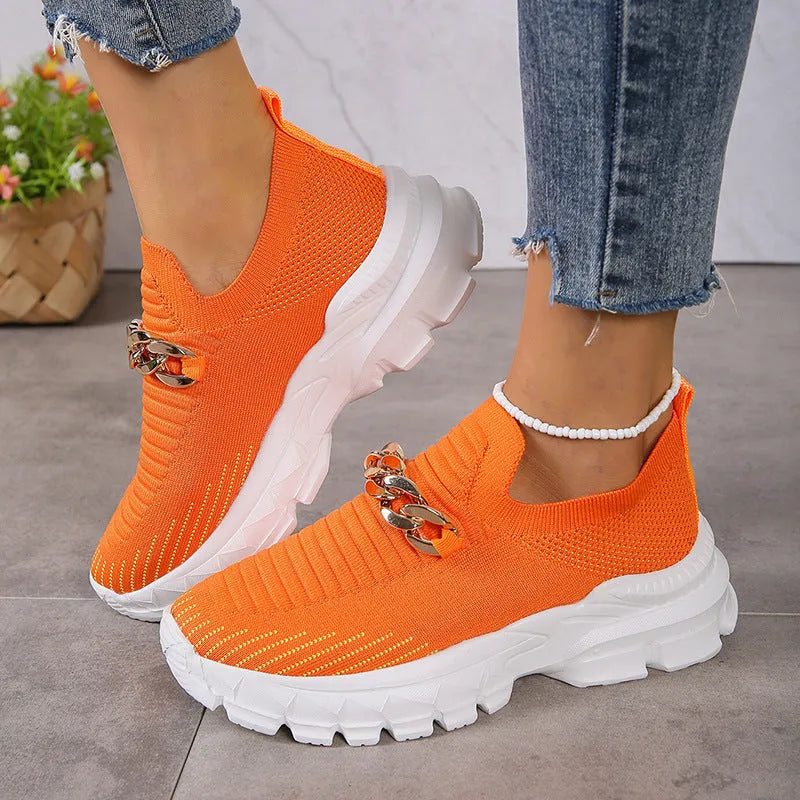 Women's chain mesh slip-on flat shoes with fly weaving upper and chunky EVA sole in beige, black, or orange