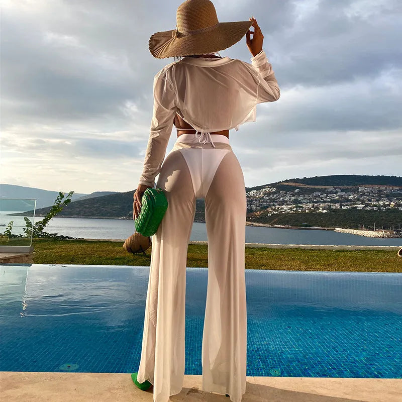 White women's four-piece swimsuit set with high-waist trousers and backless design