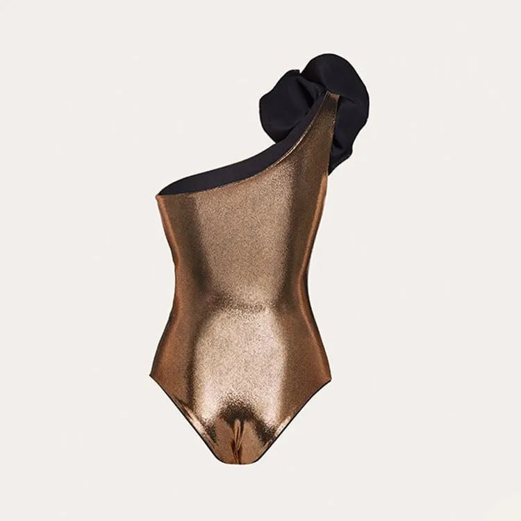 Gold handmade halter one-piece swimsuit with hollow out floral pattern on a mannequin.