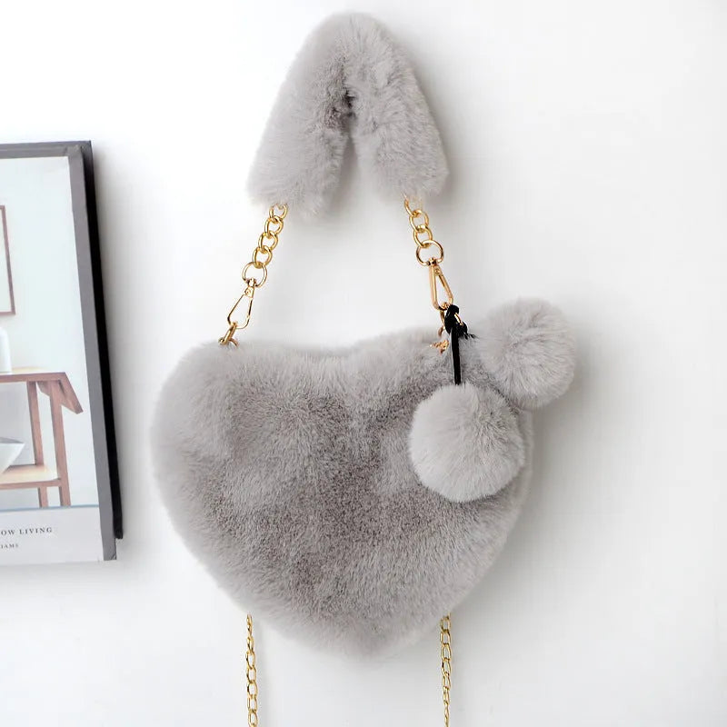 Plush heart-shaped women's handbag in medium size with removable shoulder strap