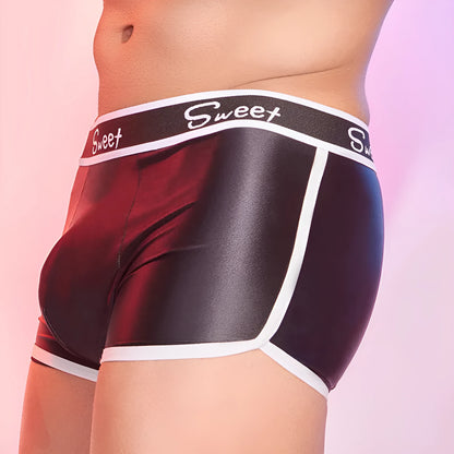 Men's shiny silky nylon boxer briefs in black, white, and sapphire blue colours.