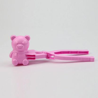 Red heart-shaped snowball maker clip for kids, perfect for winter play