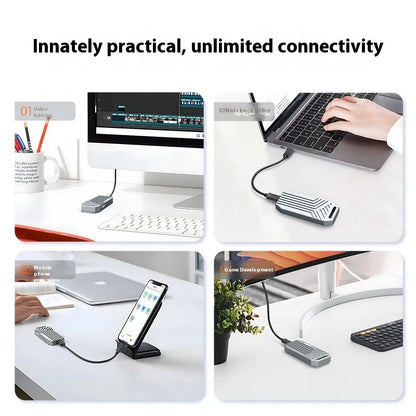 Silver aluminium Thunderbolt 4 external SSD enclosure for M.2 drives on a wooden desk