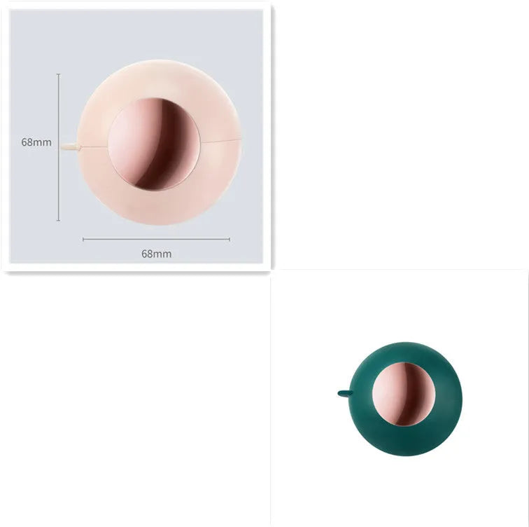 Reusable gel lint roller ball in green gold colour for removing pet hair and lint from fabrics.