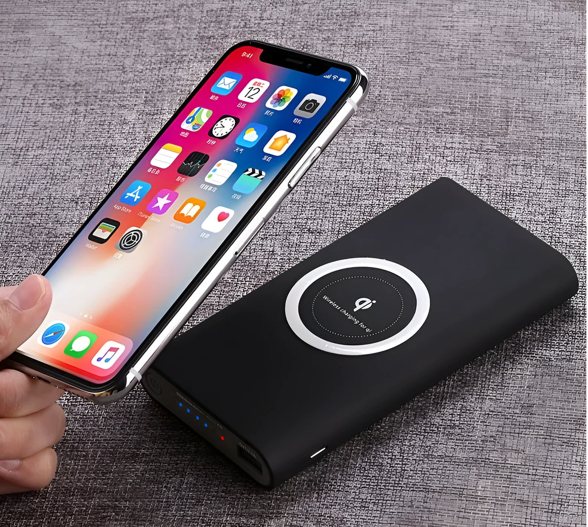 10000mAh wireless power bank in black, grey or white with USB cable and Qi wireless charging, ABS plastic, 135 x 73 x 19mm.