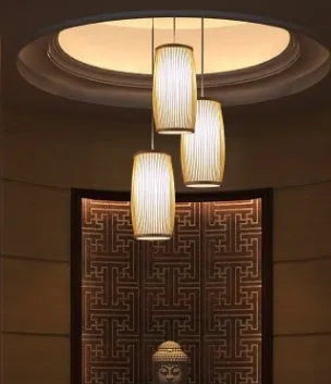 Hand-woven bamboo lamp shade with E27 holder, 35cm tall, for wall mounting.